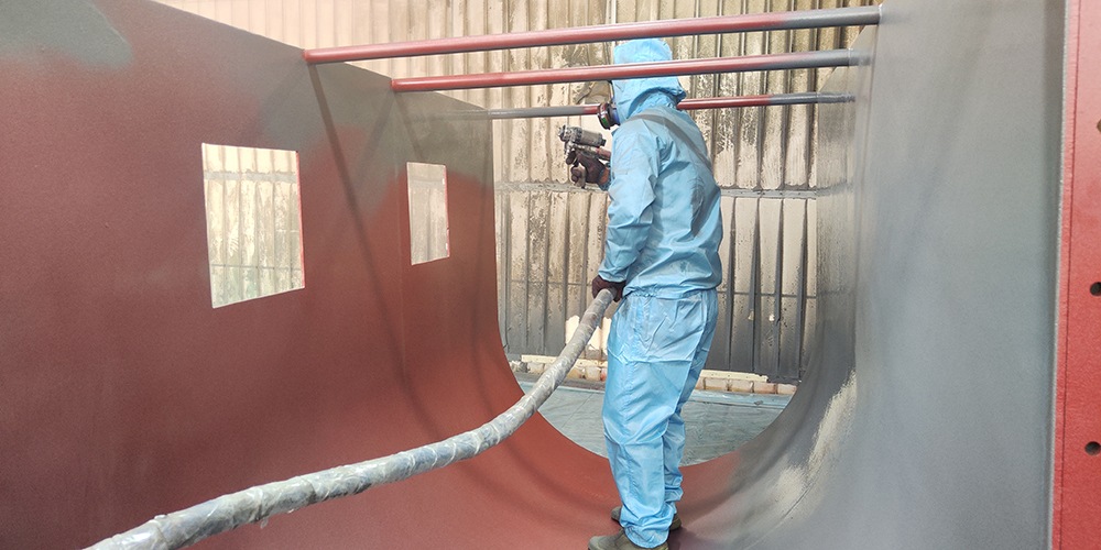 Polyurea coating applied for wear protection on mining equipment surface