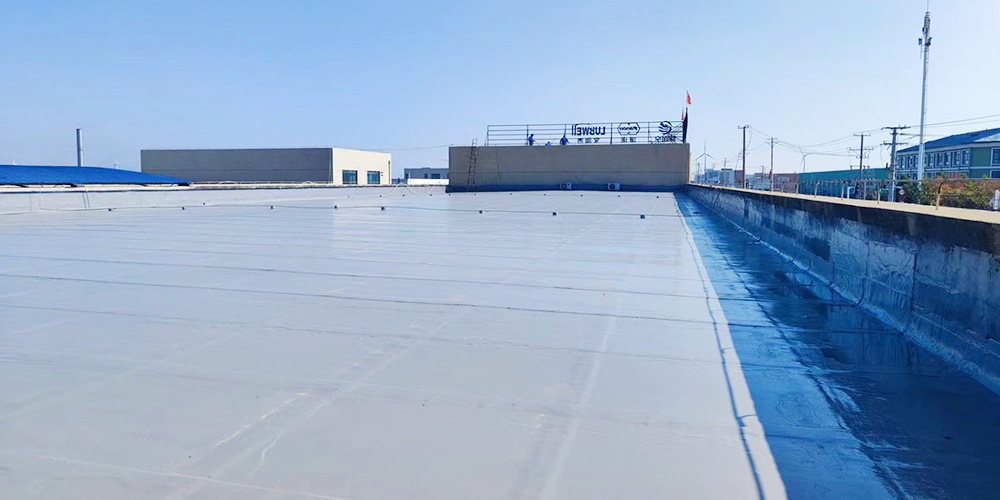 Old roof waterproofing layer renovation project on a large flat roof